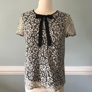 Karl Lagerfeld lace cap sleeve top with bow.